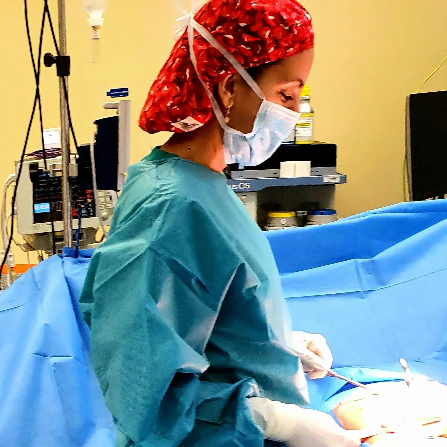 The doctor operating in theatre